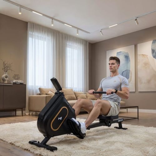 op-Sport Rudergerät im Test mit einem Mann beim Rudern zu Hause